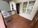 Wooden back deck featuring a stainless steel grill, wood railing, and white siding at 2912 Ashlyn Pointe Dr, Atlanta, GA 30340
