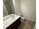 Bathroom with vanity, mirror, toilet, and tile flooring at 2912 Ashlyn Pointe Dr, Atlanta, GA 30340