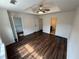 Spacious bedroom with hard wood floors, ceiling fan, closet, and en suite bathroom at 2912 Ashlyn Pointe Dr, Atlanta, GA 30340