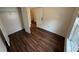 Bedroom with wood-look floors, a closet, and an electrical outlet at 2912 Ashlyn Pointe Dr, Atlanta, GA 30340