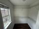 Walk-in closet equipped with shelving, providing organized storage space at 2912 Ashlyn Pointe Dr, Atlanta, GA 30340