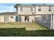 Private backyard with a patio and a fence at 319 Quincy Ave, Mcdonough, GA 30253