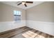 Charming bedroom with wainscoting and hardwood floors at 319 Quincy Ave, Mcdonough, GA 30253