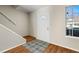 Small entryway with hardwood floors and a staircase at 319 Quincy Ave, Mcdonough, GA 30253