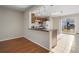 Kitchen with granite countertops and breakfast bar at 319 Quincy Ave, Mcdonough, GA 30253