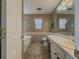 Clean bathroom with updated vanity and bathtub at 752 Bostonian Way, Lawrenceville, GA 30046