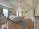 Spacious bedroom with hardwood floors and tray ceiling at 752 Bostonian Way, Lawrenceville, GA 30046