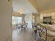 Charming breakfast nook with a glass-top table and iron chairs at 752 Bostonian Way, Lawrenceville, GA 30046