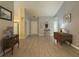 Bright and spacious entryway with wood-look floors and neutral wall colors at 752 Bostonian Way, Lawrenceville, GA 30046