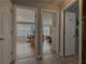 Hallway with doors to bedrooms and other rooms at 752 Bostonian Way, Lawrenceville, GA 30046
