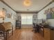 Spacious home office with hardwood floors, window, and a workspace at 752 Bostonian Way, Lawrenceville, GA 30046
