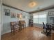 Bright home office features hardwood floors, built-in desk, and ample natural light at 752 Bostonian Way, Lawrenceville, GA 30046