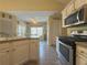 Well-equipped kitchen boasting ample counter space and an eat-in area at 752 Bostonian Way, Lawrenceville, GA 30046