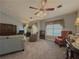 Spacious living room featuring a fireplace and ample natural light at 752 Bostonian Way, Lawrenceville, GA 30046