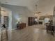 Living room featuring hardwood floors, vaulted ceiling, and fireplace at 752 Bostonian Way, Lawrenceville, GA 30046