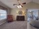 Bright living room with vaulted ceiling, fireplace, and comfy seating at 752 Bostonian Way, Lawrenceville, GA 30046