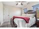 Bedroom with ceiling fan and two windows at 1005 Greenridge Trl, Loganville, GA 30052