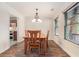 Dining room with hardwood floors and chandelier at 1005 Greenridge Trl, Loganville, GA 30052