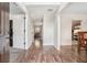 Bright entryway with hardwood floors and views into living areas at 1005 Greenridge Trl, Loganville, GA 30052