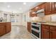 Spacious kitchen featuring granite countertops and modern appliances at 1005 Greenridge Trl, Loganville, GA 30052