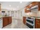 Spacious kitchen featuring granite countertops and modern appliances at 1005 Greenridge Trl, Loganville, GA 30052