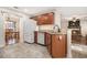 Kitchen with granite countertops, stainless steel appliances, and view into dining area at 1005 Greenridge Trl, Loganville, GA 30052