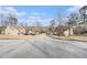 Residential street with houses and trees at 1005 Greenridge Trl, Loganville, GA 30052