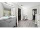 Modern bathroom with double vanity and walk-in shower at 2958 Arden Ridge Ter, Suwanee, GA 30024