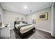 Spacious bedroom with large window and grey bedding at 2958 Arden Ridge Ter, Suwanee, GA 30024