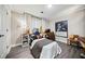 Cozy bedroom with a daybed, desk, and musical instruments at 2958 Arden Ridge Ter, Suwanee, GA 30024