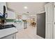 Kitchen with white cabinets, granite counters, and stainless steel appliances at 2958 Arden Ridge Ter, Suwanee, GA 30024