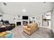 Living room features a fireplace and an open floor plan at 2958 Arden Ridge Ter, Suwanee, GA 30024