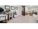 Bright home office space with desk and view to living room at 2958 Arden Ridge Ter, Suwanee, GA 30024