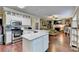 Spacious kitchen featuring an island and stainless steel appliances at 3165 Goldmist Dr, Buford, GA 30519