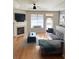 Spacious living room with hardwood floors and fireplace at 3500 Sweetwater Rd # 424, Duluth, GA 30096