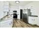 Modern kitchen with granite countertops and stainless steel appliances at 2555 Flat Shoals Rd # 3005, South Fulton, GA 30349
