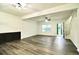 Spacious living room with hardwood floors and a ceiling fan at 2555 Flat Shoals Rd # 3005, South Fulton, GA 30349