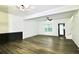 Spacious living room with hardwood floors and a ceiling fan at 2555 Flat Shoals Rd # 3005, South Fulton, GA 30349