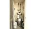 Water heater closet with Rheem tank and paint cans at 2555 Flat Shoals Rd # 3005, South Fulton, GA 30349