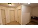 Upstairs hallway with neutral walls and carpet at 3335 Castleberry Village Cir, Cumming, GA 30040