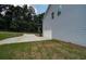 Detached garage with driveway and grassy yard at 4537 Ajo Walk, Atlanta, GA 30331