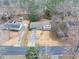 Aerial view of house and surrounding neighborhood at 2343 Meadow Dr, Snellville, GA 30078
