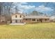 Ranch house with large backyard, patio and mature trees at 2343 Meadow Dr, Snellville, GA 30078