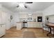 Bright kitchen with light cabinets, granite counters, and stainless steel appliances at 2343 Meadow Dr, Snellville, GA 30078