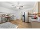 Open kitchen features stainless steel appliances and granite countertops at 2343 Meadow Dr, Snellville, GA 30078
