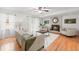 Living room features hardwood floors, fireplace, and lots of natural light at 2343 Meadow Dr, Snellville, GA 30078
