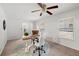 Home office featuring a ceiling fan and large windows at 2343 Meadow Dr, Snellville, GA 30078