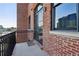 Urban balcony with brick wall and iron railing at 3235 Roswell Ne Rd # 716, Atlanta, GA 30305