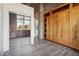Bedroom with built-in wood closet and hardwood floors at 3235 Roswell Ne Rd # 716, Atlanta, GA 30305