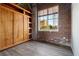 Bedroom with built-in wood closet and hardwood floors at 3235 Roswell Ne Rd # 716, Atlanta, GA 30305